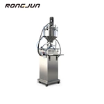 Manual syringe pre-filling and filling machine
