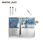 Pre-filling syringe filling and stuffing machine