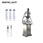 Manual syringe pre-filling and filling machine